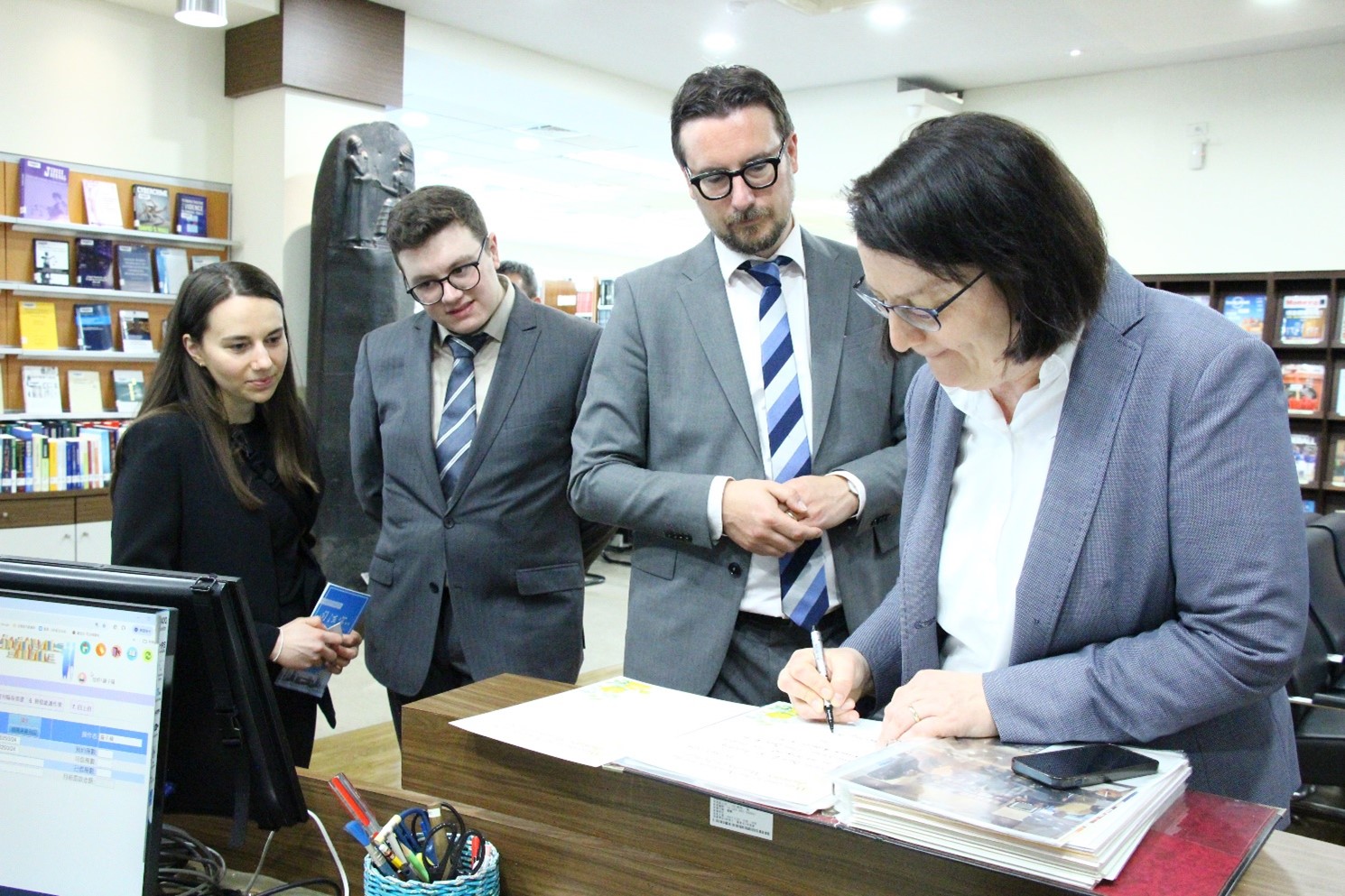 The Delegation from Trier University Visited AJMJ on March 24, 2025.03